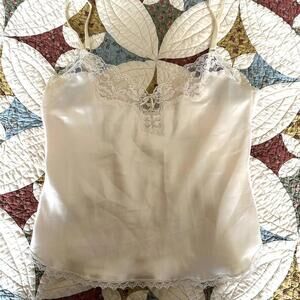 Vintage 1960s or 1970s cream lace cami top with adjustable straps and bow size L
